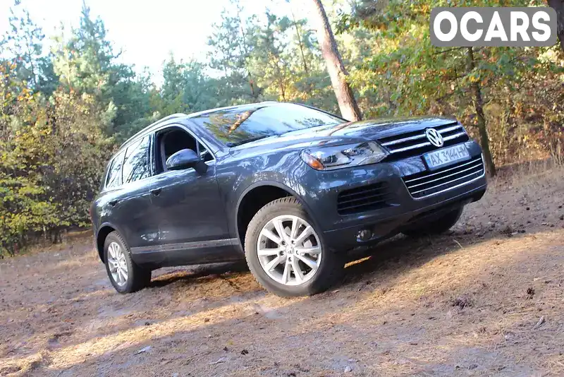 Внедорожник / Кроссовер Volkswagen Touareg 2014 3.6 л. Автомат обл. Харьковская, Харьков - Фото 1/21