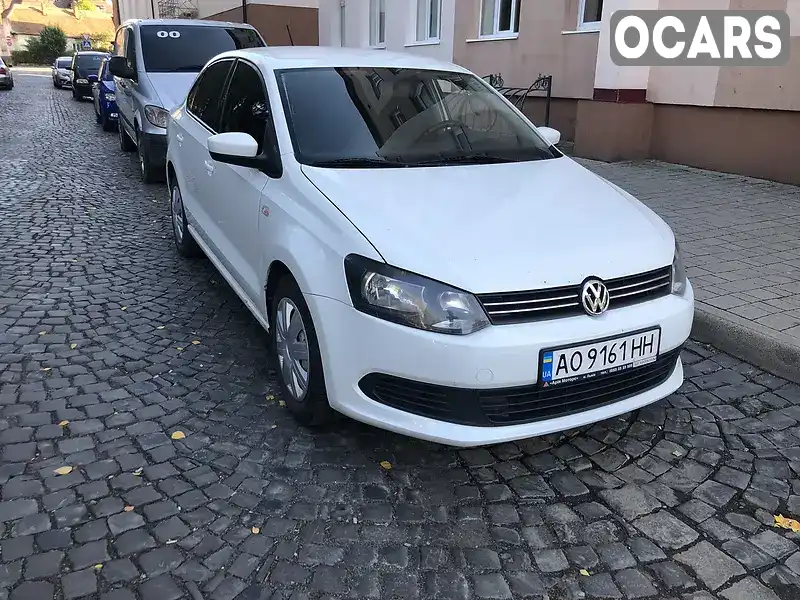 Седан Volkswagen Polo 2014 1.6 л. Ручна / Механіка обл. Закарпатська, Мукачево - Фото 1/21