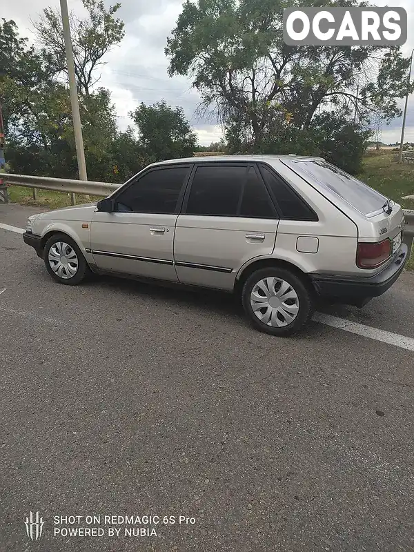 Хэтчбек Mazda 323 1988 1.3 л. Ручная / Механика обл. Одесская, Одесса - Фото 1/15