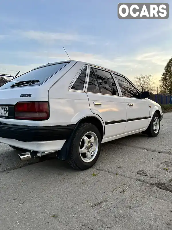 Хетчбек Mazda 323 1989 1.3 л. Ручна / Механіка обл. Львівська, Кам'янка-Бузька - Фото 1/20