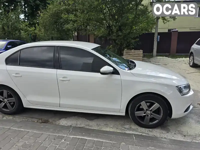 Седан Volkswagen Jetta 2013 1.6 л. Ручная / Механика обл. Львовская, Львов - Фото 1/21