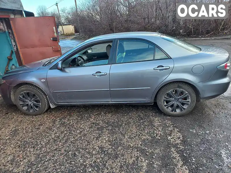 Седан Mazda 6 2003 2 л. Ручная / Механика обл. Днепропетровская, Апостолово - Фото 1/12