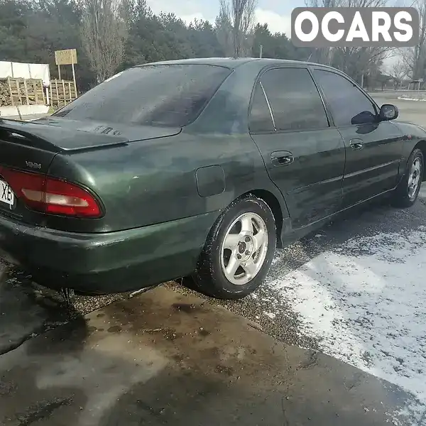 Седан Mitsubishi Galant 1994 2 л. Автомат обл. Днепропетровская, Першотравенск - Фото 1/10