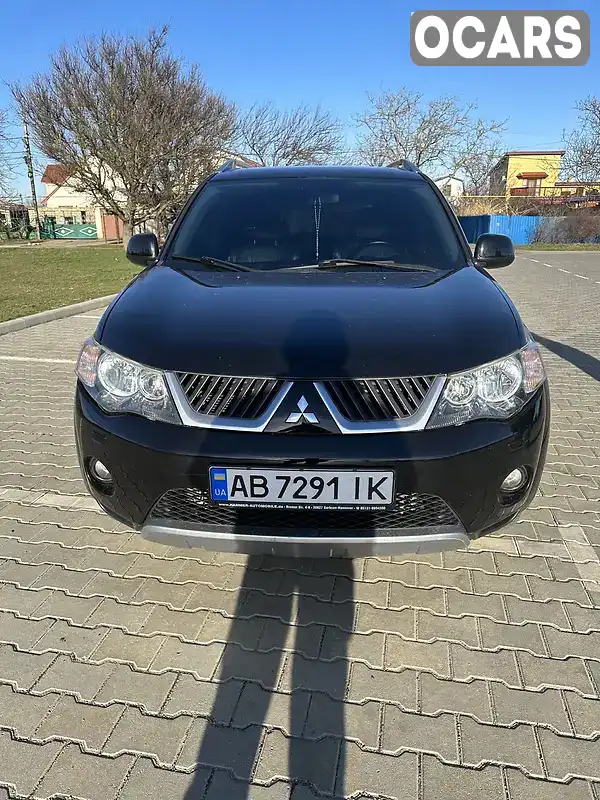 Позашляховик / Кросовер Mitsubishi Outlander XL 2008 2.4 л. Варіатор обл. Житомирська, Бердичів - Фото 1/21