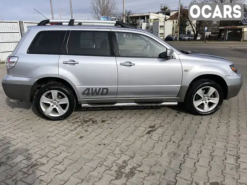 Внедорожник / Кроссовер Mitsubishi Outlander 2003 2 л. обл. Львовская, Львов - Фото 1/21