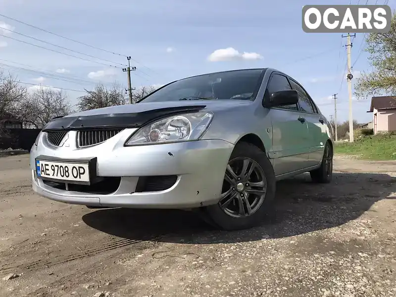 Седан Mitsubishi Lancer 2004 1.59 л. Ручна / Механіка обл. Дніпропетровська, Дніпро (Дніпропетровськ) - Фото 1/16