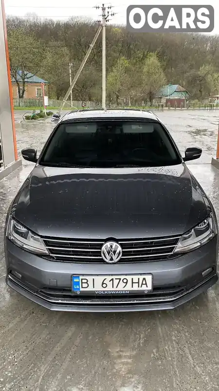 Седан Volkswagen Jetta 2015 1.8 л. Автомат обл. Полтавская, Полтава - Фото 1/21