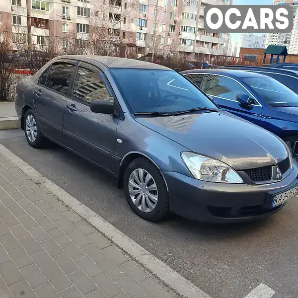 Седан Mitsubishi Lancer 2008 1.6 л. Автомат обл. Київська, Київ - Фото 1/21