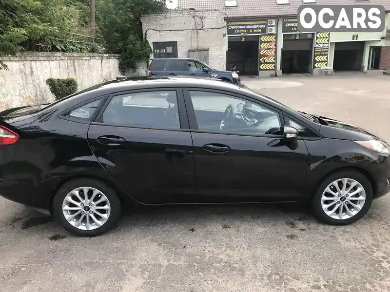 Седан Ford Fiesta 2013 1.6 л. Автомат обл. Днепропетровская, Каменское (Днепродзержинск) - Фото 1/21