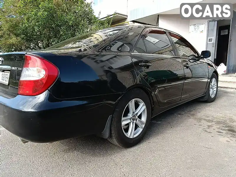 Седан Toyota Camry 2003 2.4 л. Автомат обл. Кировоградская, Александрия - Фото 1/16