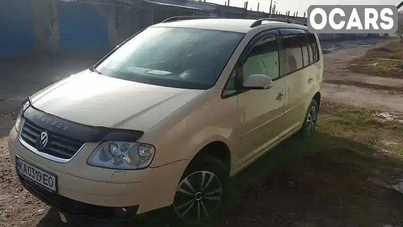 Минивэн Volkswagen Touran 2006 1.9 л. Ручная / Механика обл. Днепропетровская, Вольногорск - Фото 1/21