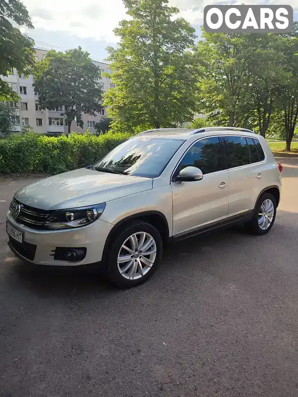 Внедорожник / Кроссовер Volkswagen Tiguan 2011 2 л. Автомат обл. Черниговская, Нежин - Фото 1/13