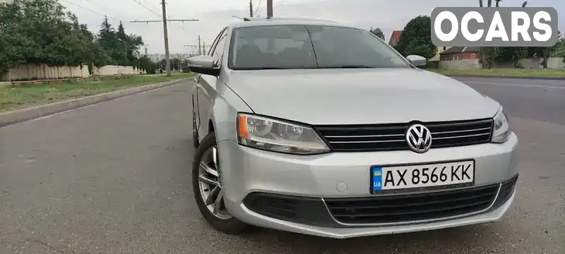 Седан Volkswagen Jetta 2013 2 л. Типтроник обл. Харьковская, Харьков - Фото 1/9