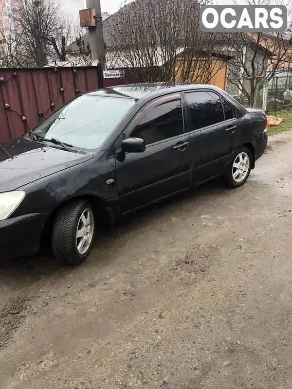 Седан Mitsubishi Lancer 2008 1.6 л. Ручная / Механика обл. Хмельницкая, Хмельницкий - Фото 1/8