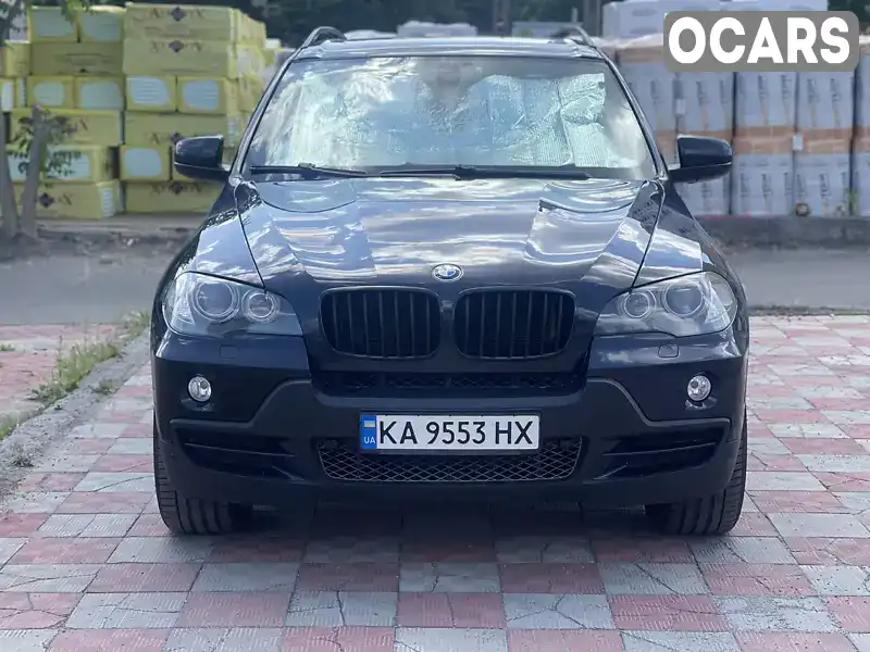 Позашляховик / Кросовер BMW X5 2009 3 л. Автомат обл. Київська, Вишневе - Фото 1/11