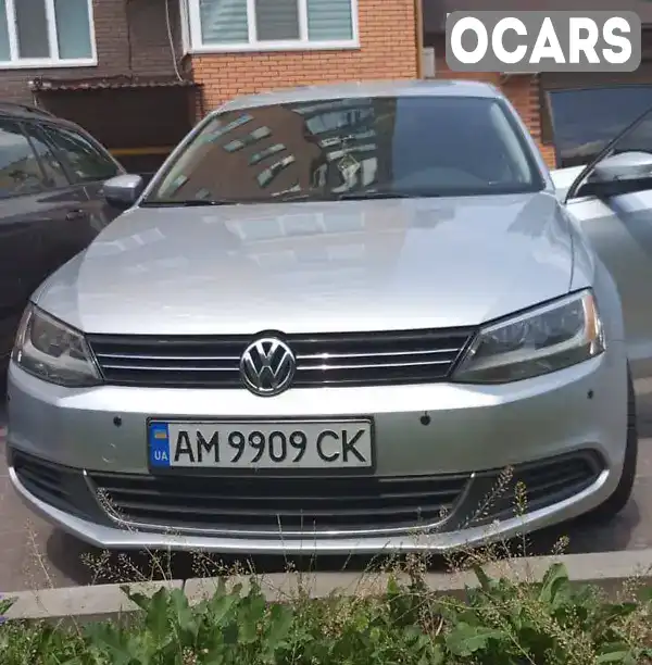 Седан Volkswagen Jetta 2014 1.8 л. Автомат обл. Житомирская, Житомир - Фото 1/8