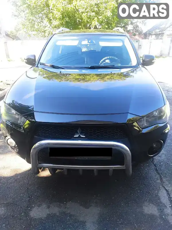 Позашляховик / Кросовер Mitsubishi Outlander XL 2010 2 л. Варіатор обл. Харківська, Лозова - Фото 1/10