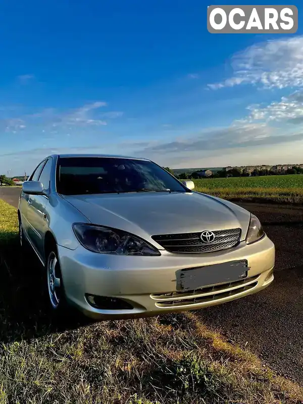 Седан Toyota Camry 2004 2.4 л. Автомат обл. Кировоградская, Гайворон - Фото 1/11