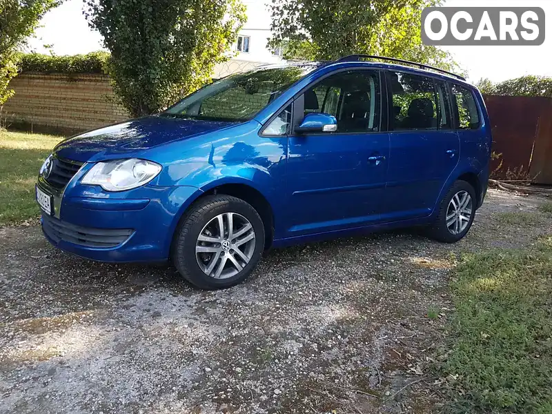 Мінівен Volkswagen Touran 2008 1.39 л. Ручна / Механіка обл. Запорізька, Запоріжжя - Фото 1/21