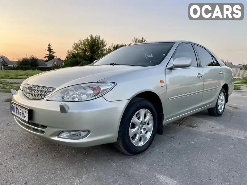 Седан Toyota Camry 2004 2.4 л. Автомат обл. Полтавская, Хорол - Фото 1/21