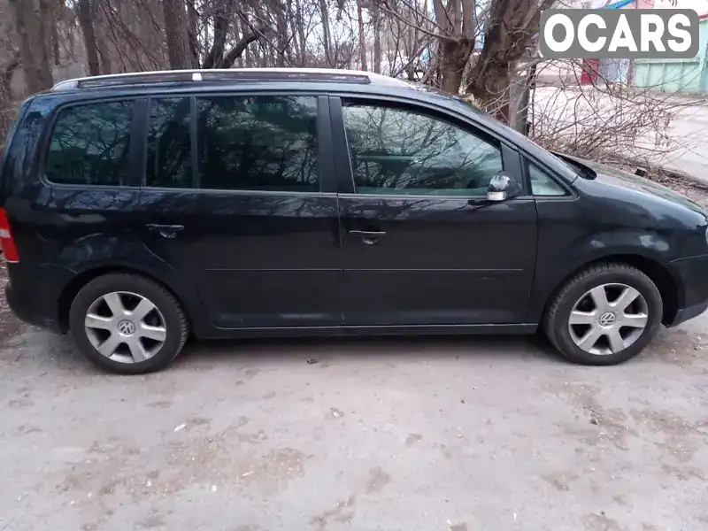 Минивэн Volkswagen Touran 2004 1.97 л. Ручная / Механика обл. Киевская, Киев - Фото 1/21