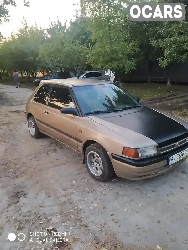 Хэтчбек Mazda 323 1993 1.32 л. Ручная / Механика обл. Житомирская, Житомир - Фото 1/11