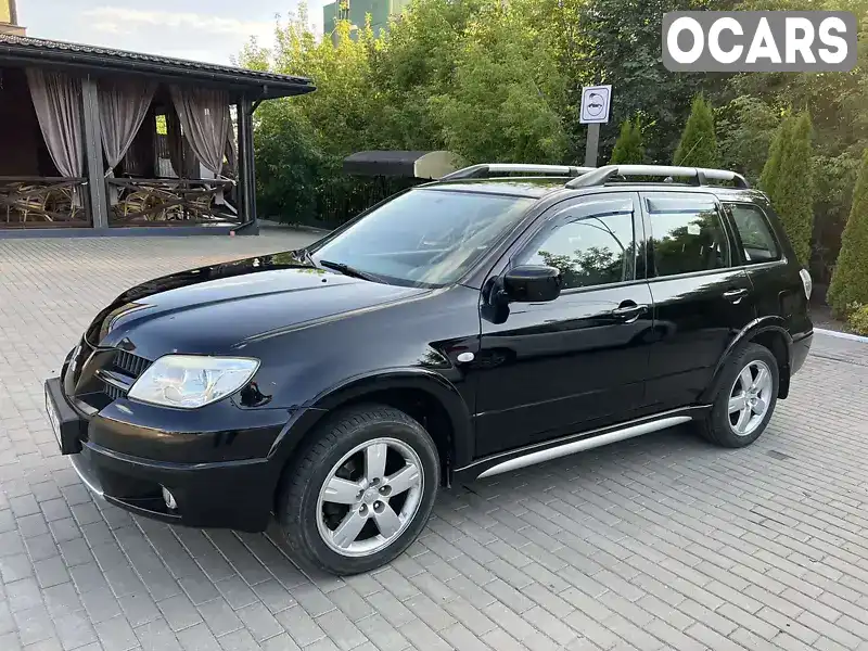 Позашляховик / Кросовер Mitsubishi Outlander 2008 2.4 л. Автомат обл. Рівненська, Рівне - Фото 1/14