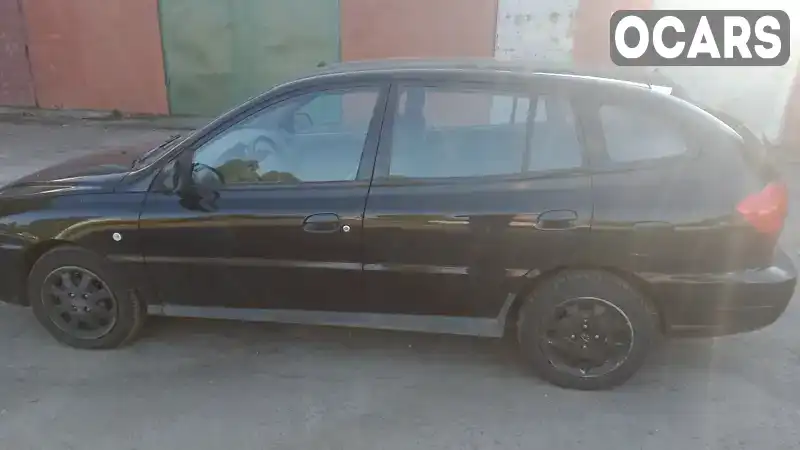 Универсал Kia Rio 2004 1.34 л. Ручная / Механика обл. Киевская, Вышневое - Фото 1/8