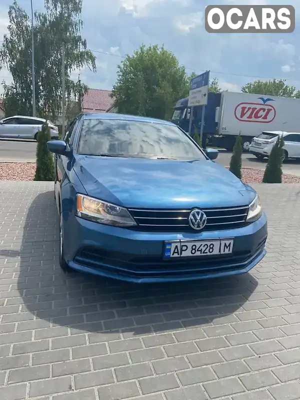 Седан Volkswagen Jetta 2014 1.8 л. Автомат обл. Київська, Вишневе - Фото 1/21