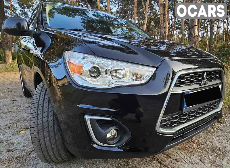 Позашляховик / Кросовер Mitsubishi Outlander Sport 2015 2 л. Автомат обл. Київська, Київ - Фото 1/21