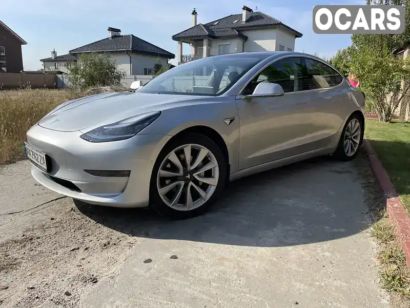 Седан Tesla Model 3 2018 null_content л. Автомат обл. Киевская, Киев - Фото 1/21