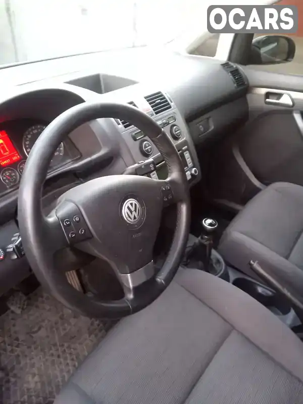 Мінівен Volkswagen Touran 2007 1.6 л. Ручна / Механіка обл. Дніпропетровська, Кривий Ріг - Фото 1/16