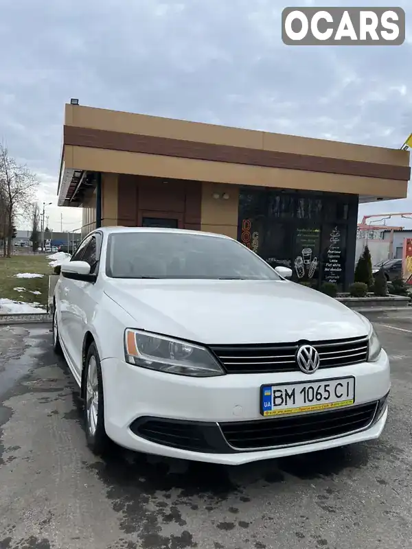 Седан Volkswagen Jetta 2013 2.48 л. обл. Сумська, Суми - Фото 1/11