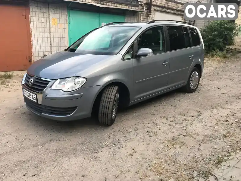 Мінівен Volkswagen Touran 2007 1.98 л. Ручна / Механіка обл. Дніпропетровська, Дніпро (Дніпропетровськ) - Фото 1/21