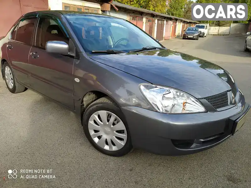 Седан Mitsubishi Lancer 2006 1.6 л. Ручна / Механіка обл. Київська, Київ - Фото 1/21