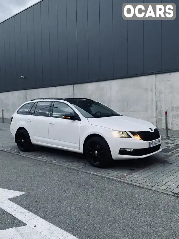 Универсал Skoda Octavia 2018 2 л. Ручная / Механика обл. Киевская, Вышневое - Фото 1/13