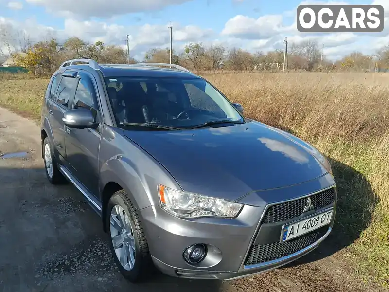 Внедорожник / Кроссовер Mitsubishi Outlander 2009 3 л. Автомат обл. Киевская, Буча - Фото 1/21