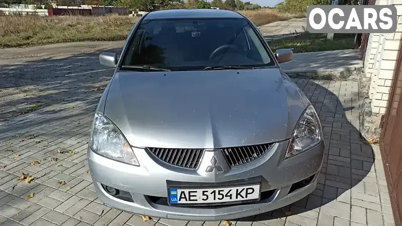 Седан Mitsubishi Lancer 2004 1.58 л. Ручна / Механіка обл. Дніпропетровська, Дніпро (Дніпропетровськ) - Фото 1/15