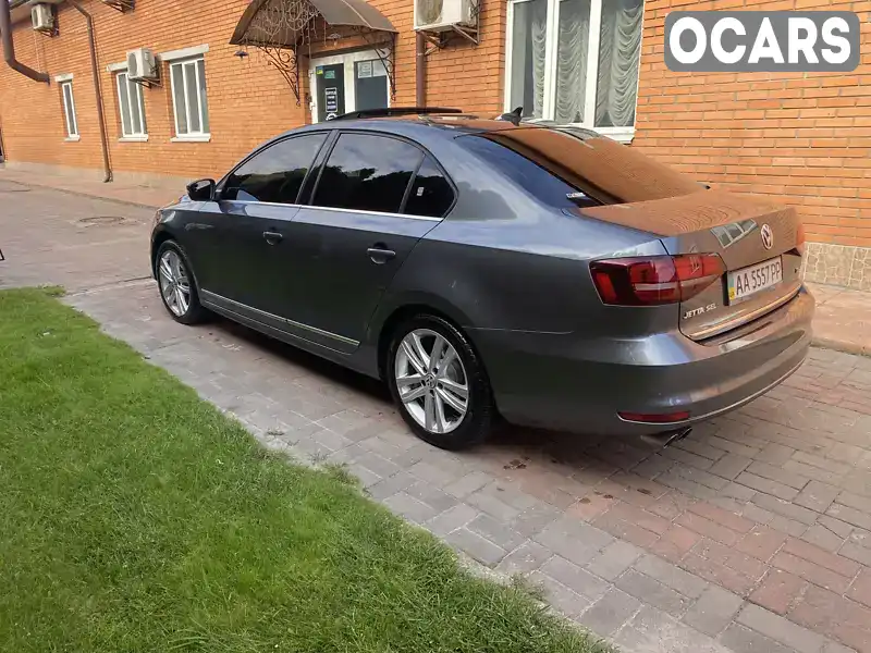 Седан Volkswagen Jetta 2017 1.8 л. Автомат обл. Київська, Вишневе - Фото 1/20