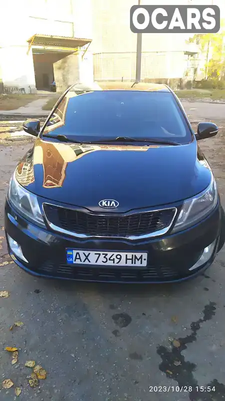 Седан Kia Rio 2013 1.59 л. Автомат обл. Харківська, Лозова - Фото 1/21