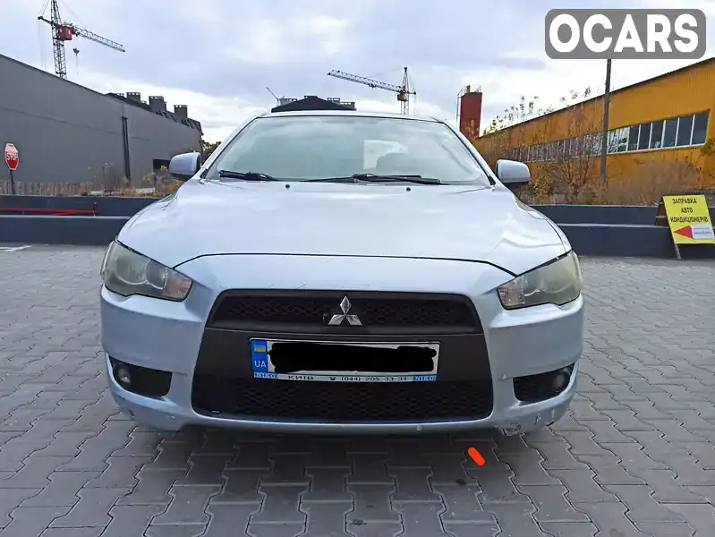 Седан Mitsubishi Lancer 2009 2 л. Ручна / Механіка обл. Київська, Вишневе - Фото 1/11