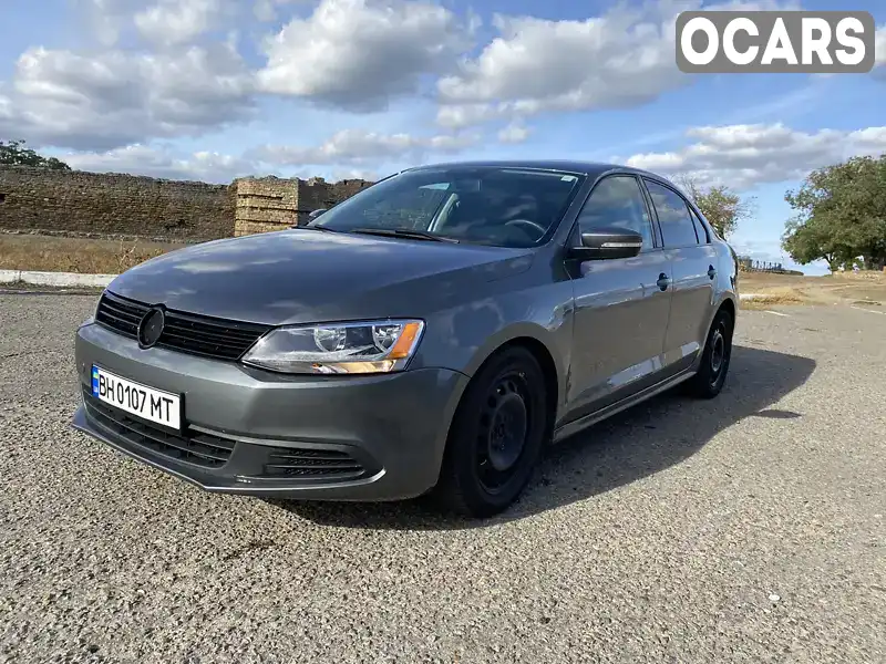 Седан Volkswagen Jetta 2013 1.8 л. Автомат обл. Одеська, Білгород-Дністровський - Фото 1/18