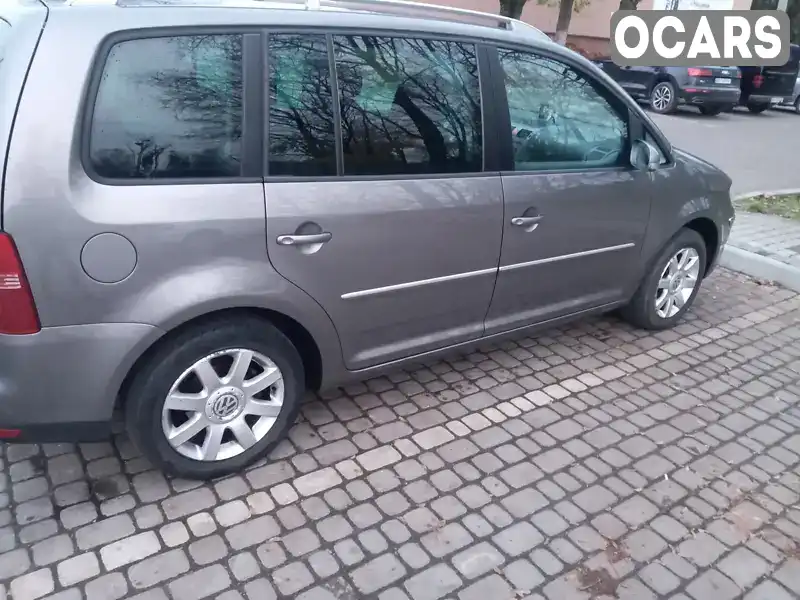 Минивэн Volkswagen Touran 2007 1.4 л. Ручная / Механика обл. Львовская, Пустомыты - Фото 1/21