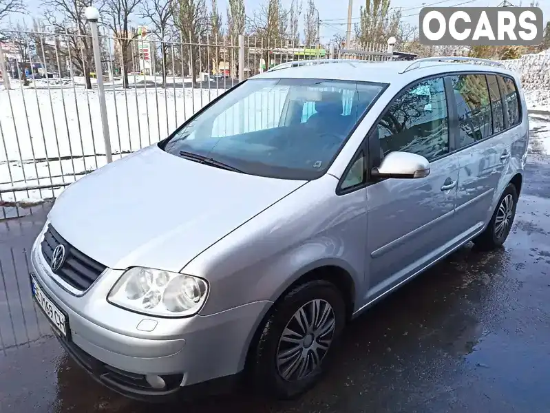 Минивэн Volkswagen Touran 2004 1.97 л. Автомат обл. Николаевская, Николаев - Фото 1/18