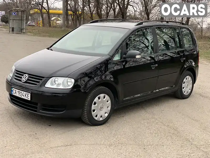 Мінівен Volkswagen Touran 2005 1.9 л. Ручна / Механіка обл. Київська, Київ - Фото 1/16