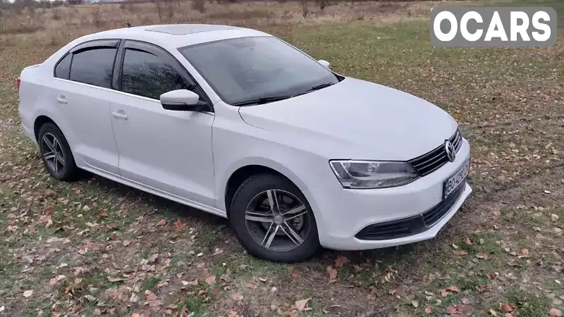 Седан Volkswagen Jetta 2014 1.8 л. Автомат обл. Хмельницька, Летичів - Фото 1/11