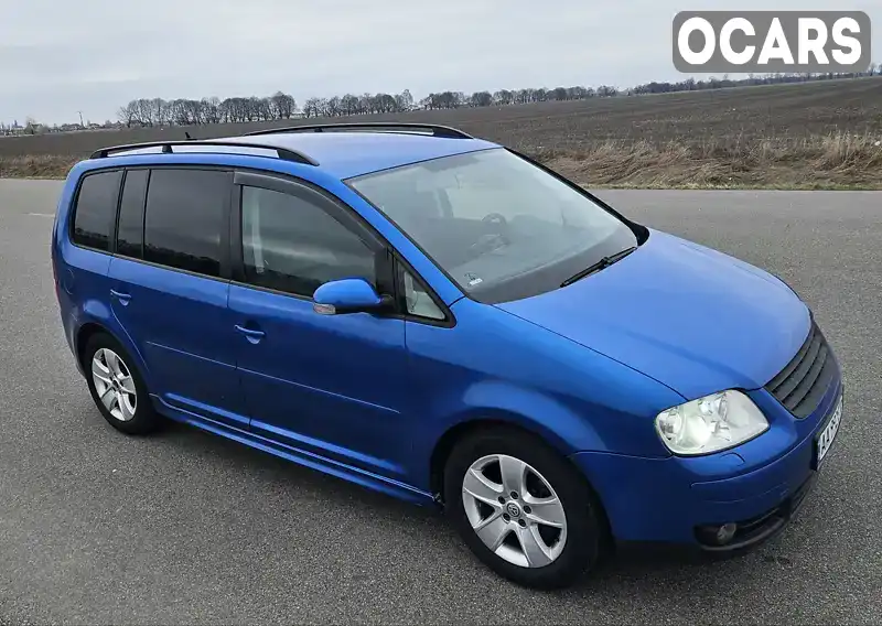 Мінівен Volkswagen Touran 2004 2 л. Ручна / Механіка обл. Київська, Бориспіль - Фото 1/21