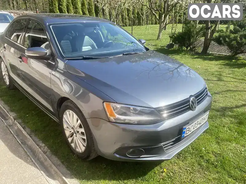 Седан Volkswagen Jetta 2013 1.8 л. Автомат обл. Львівська, Львів - Фото 1/9