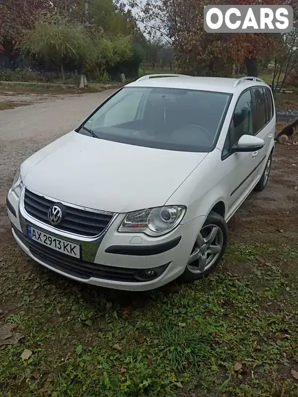 Мінівен Volkswagen Touran 2009 1.4 л. Ручна / Механіка обл. Харківська, Харків - Фото 1/16