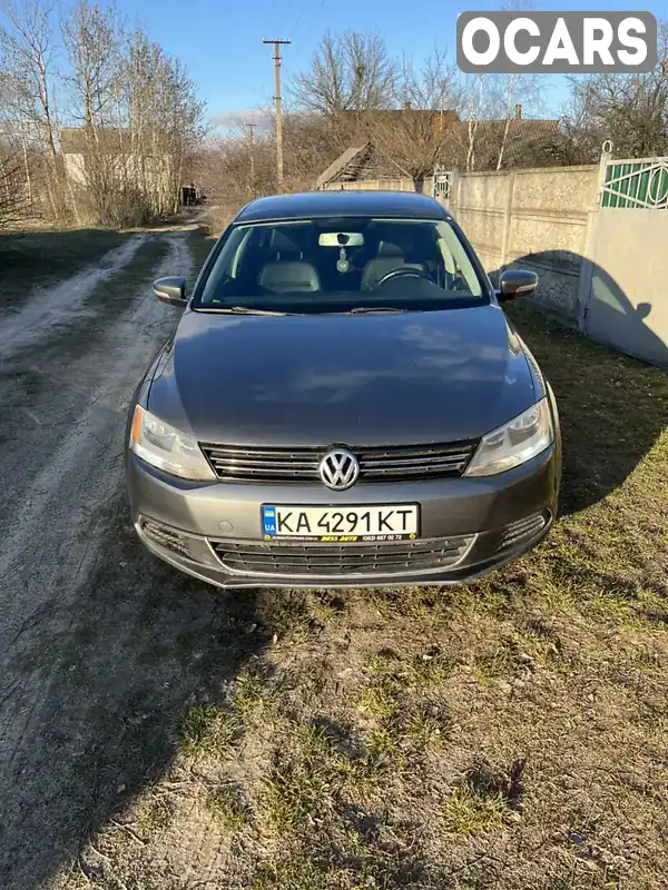 Седан Volkswagen Jetta 2013 1.8 л. Автомат обл. Київська, Київ - Фото 1/21